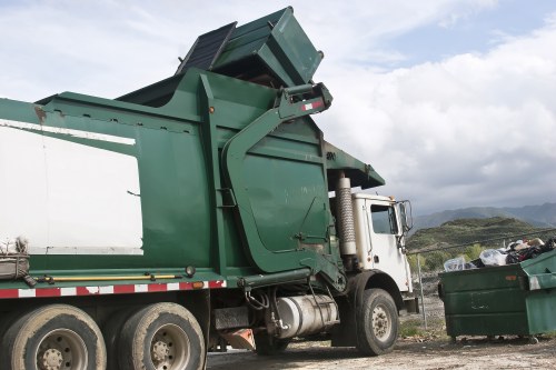 Waste collection trucks in Kilburn